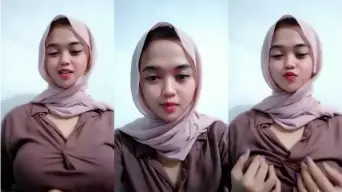 Gadis Berhijab Montok Meremas Payudara Menggoda Pria